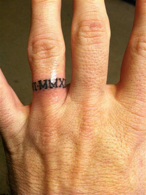 tattoo finger ring|ring finger tattoos for men.